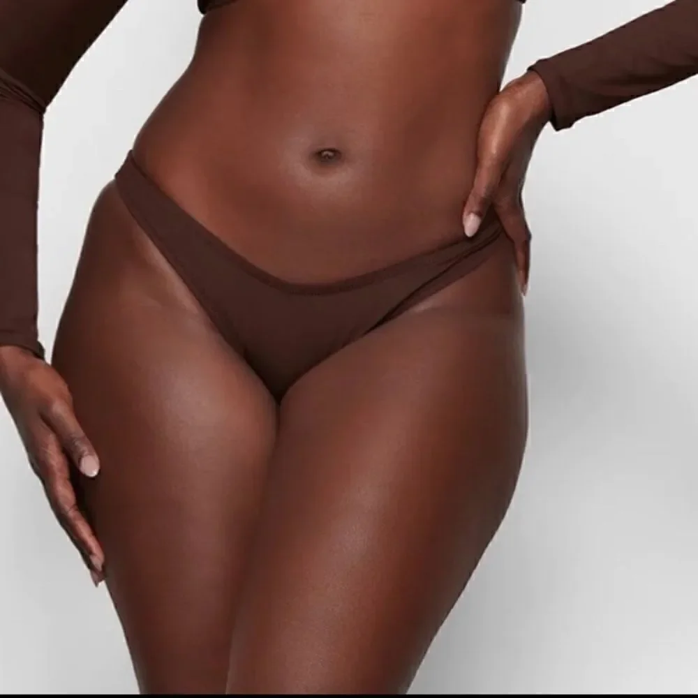 SKIMS SWIM BIKINI bottoms in chocolate brown